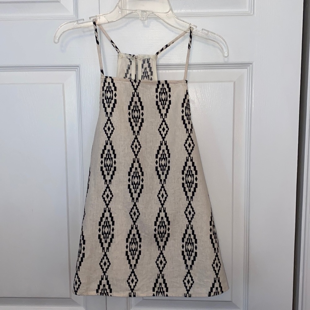 Everly tank top with T-back button closure off white and black pattern. size M